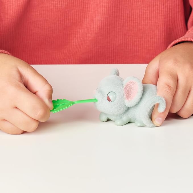 Little Live Pets - Mama Surprise Minis. Feed and Nurture a Lil' Mouse Inside Their Hutch so she can be a Mama. She has 2, 3, or 4 Babies with Surprise Accessories to Dress Up The Babies