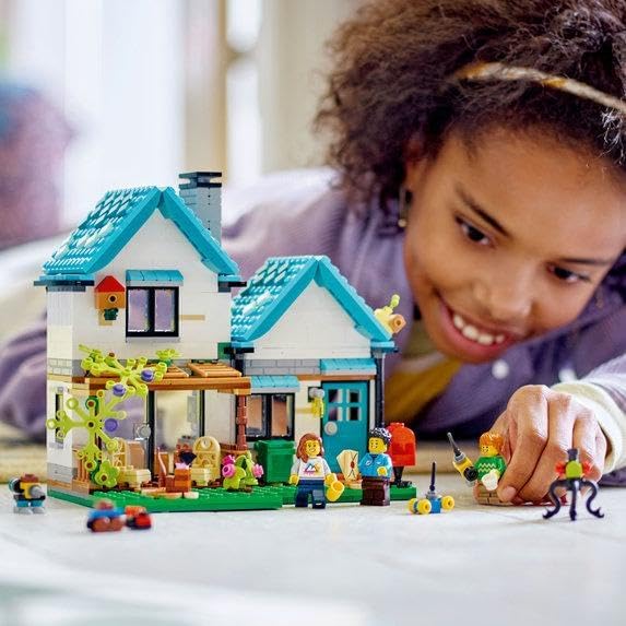 LEGO Creator 3 in 1 Cozy House Building Kit, Rebuild into 3 Different Houses, Includes Family Minifigures and Accessories, DIY Building Toy Ideas for Outdoor Play for Kids, Boys and Girls, 31139