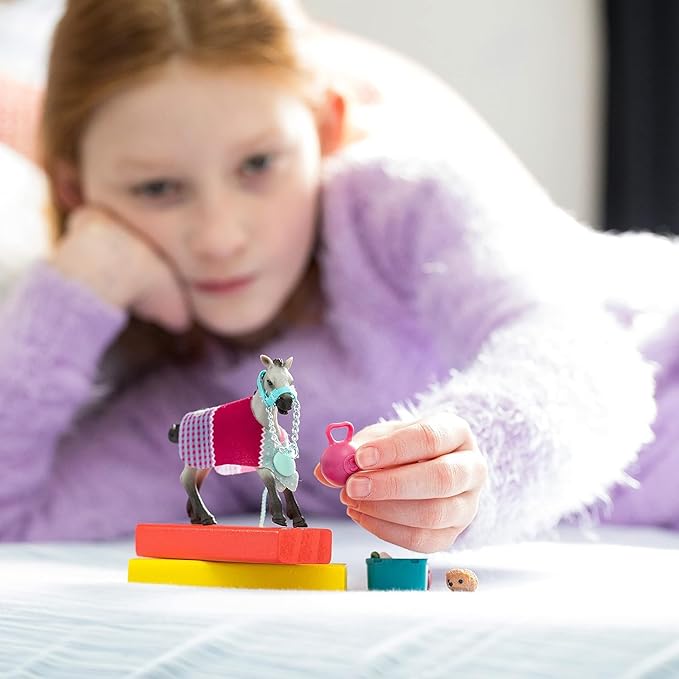 Schleich Horse Club Playful Foal Horse Playset - Authentic Toy Figure with Removable Blanket, Bottle, and Ball Accessories, Fun and Imaginative Play for Boys and Girls, Gift for Kids Ages 5+