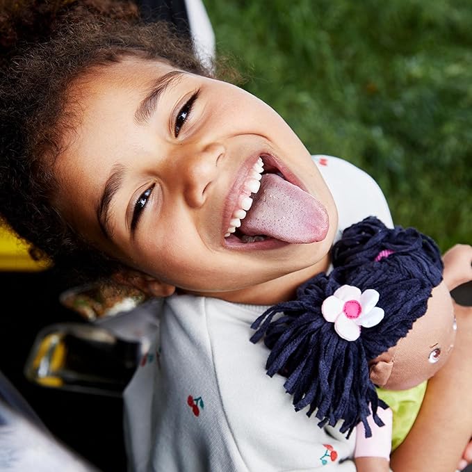 HABA Cari 12" Soft Doll - Machine Washable with Green Dress, Embroidered Face, Brown Eyes and Black Pigtails