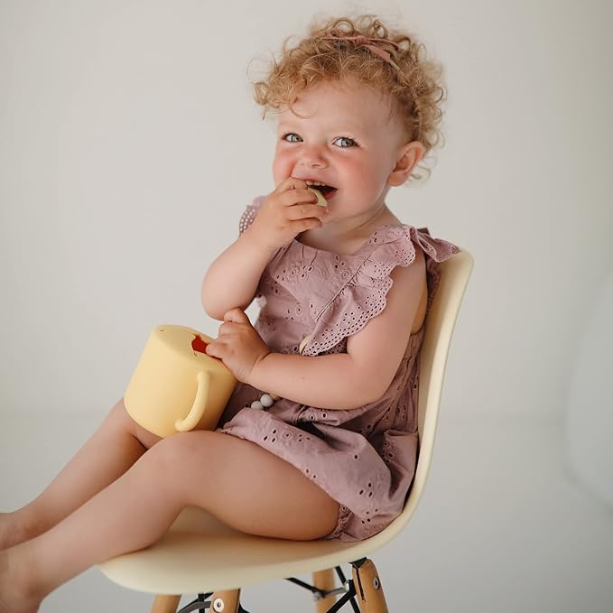 mushie Silicone Snack Cup | Spill Proof Food Container for Toddler and Baby (Daffodil)