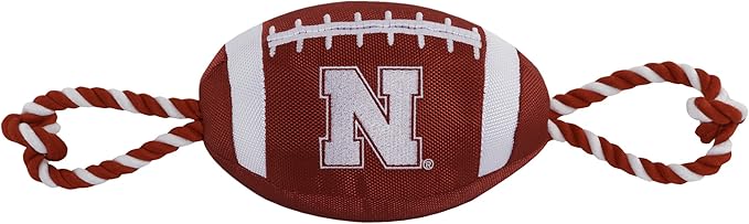 Pets First NCAA Nebraska Cornhuskers Football Dog Toy, Tough Quality Nylon Materials, Strong Pull Ropes, Inner Squeaker, Collegiate Team Color
