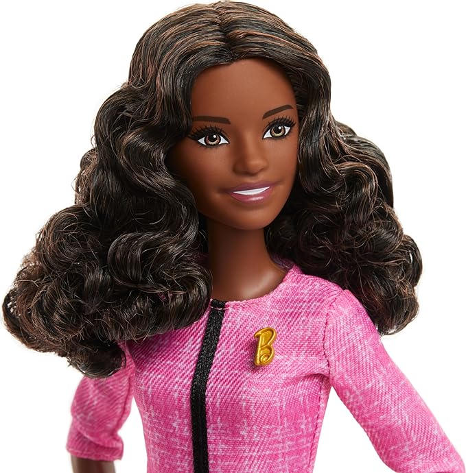 Barbie Careers Doll & Accessories, Future Leader with Dark Brown Hair Wearing Outfit with 2 Golden Bracelets & â€œBâ€ Pin, Includes Sticker for Kids