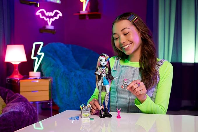 Monster High Frankie Stein Doll in Denim Jacket & Shorts, Includes Pet Dog Watzie & Accessories Like a Backpack, Snack & Notebook