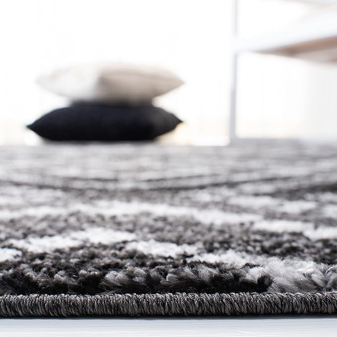 SAFAVIEH Adirondack Collection Accent Rug - 3' x 5', Black & Ivory, Modern Distressed Design, Non-Shedding & Easy Care, Ideal for High Traffic Areas in Entryway, Living Room, Bedroom (ADR131A)