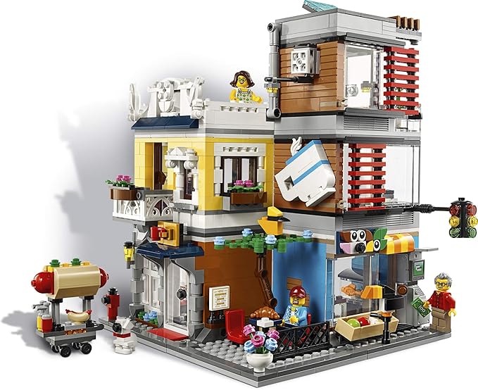 LEGO Creator 3 in 1 Townhouse Pet Shop & Café 31097 Toy Store Building Set with Bank, Town Playset with a Toy Tram, Animal Figures and Minifigures (969 Pieces)