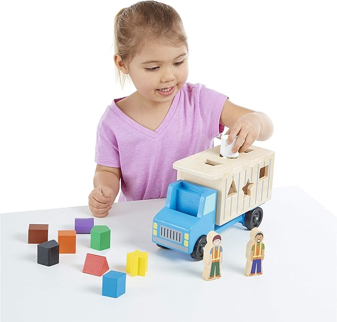 Melissa & Doug Shape-Sorting Wooden Dump Truck Toy, Quality Craftsmanship, 9 Colorful Shapes and 2 Play Figures, 7.5' H X 10.75' W X 4.75' L