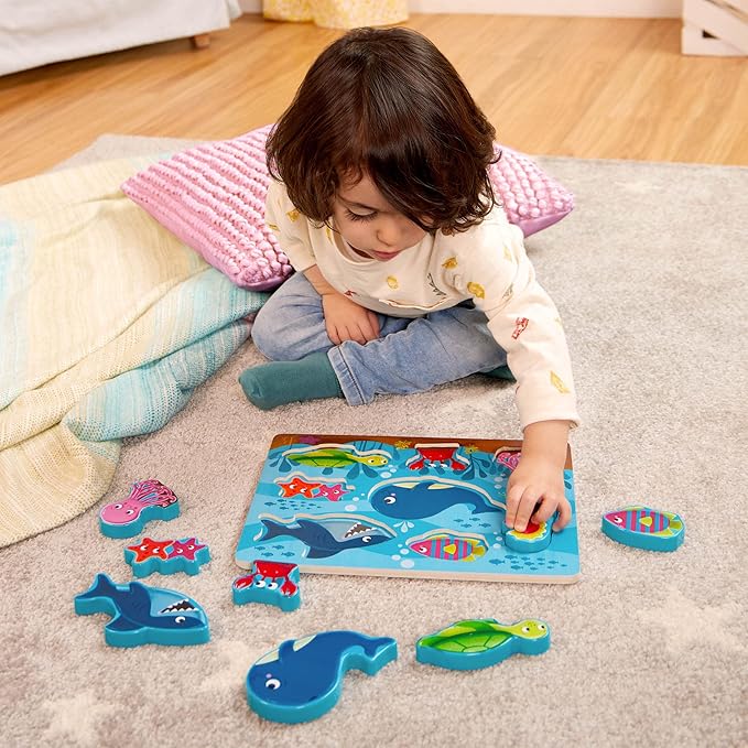 B. toys- Peek & Explore 5-Pack: Bus, Farm, Sea, Space, Dino- Chunky Puzzle 5-Pack – Wooden Puzzles– 8 Pieces Each – 2 Years +