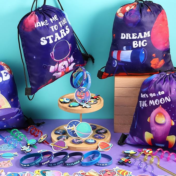 Sadnyy 140 Pcs Space Party Favors Outer Space Party Gift Bulk Galaxy Drawstring Backpack with Silicone Bracelet Straws Keychains Pin Badges Stickers for Christmas Space Party Theme Birthday Supplies