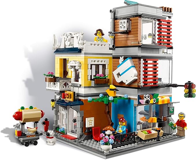 LEGO Creator 3 in 1 Townhouse Pet Shop & Café 31097 Toy Store Building Set with Bank, Town Playset with a Toy Tram, Animal Figures and Minifigures (969 Pieces)