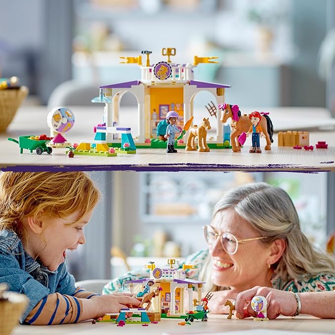 LEGO Friends Riding School Set with 2 Toy Horses, Aliya and Mia Mini Dolls, Riding Stable and Horse Toy, Animal Care Gift for Children, Girls and Boys from 4 Years 41746