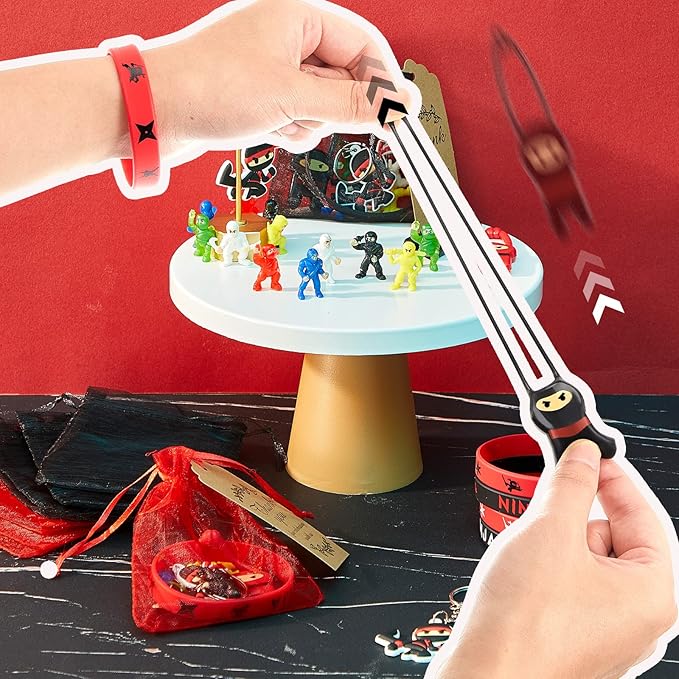84 Pcs Ninja Party Favors Include 12 Stretchy Flying Ninjas, 24 Mini Ninja Figurines, 12 Ninja Silicone Wristbands, 12 Ninja Keychains, 12 Red and Black Organza Bags and 12 Gift Tags for Birthday