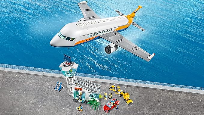 LEGO City Passenger Airplane 60262, with Radar Tower, Airport Truck with a Car Elevator, Red Convertible, 4 Passenger and 4 Airport Staff Minifigures, Plus a Baby Figure (669 Pieces)
