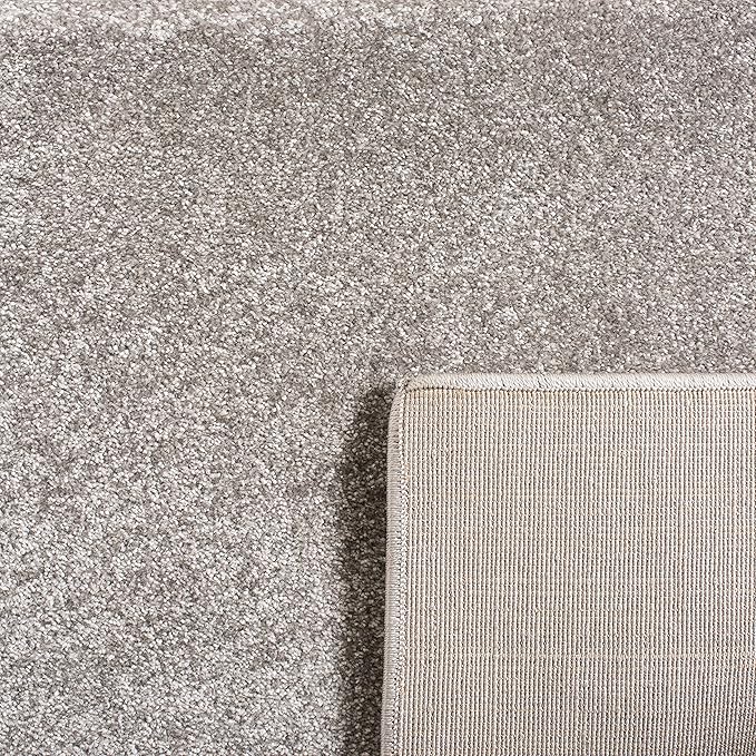 SAFAVIEH Carousel Kids Collection Area Rug - 6'7" x 9', Grey & Ivory, Elephant Design, Non-Shedding & Easy Care, Ideal for High Traffic Areas for Boys & Girls in Playroom, Nursery, Bedroom (CRK165B)